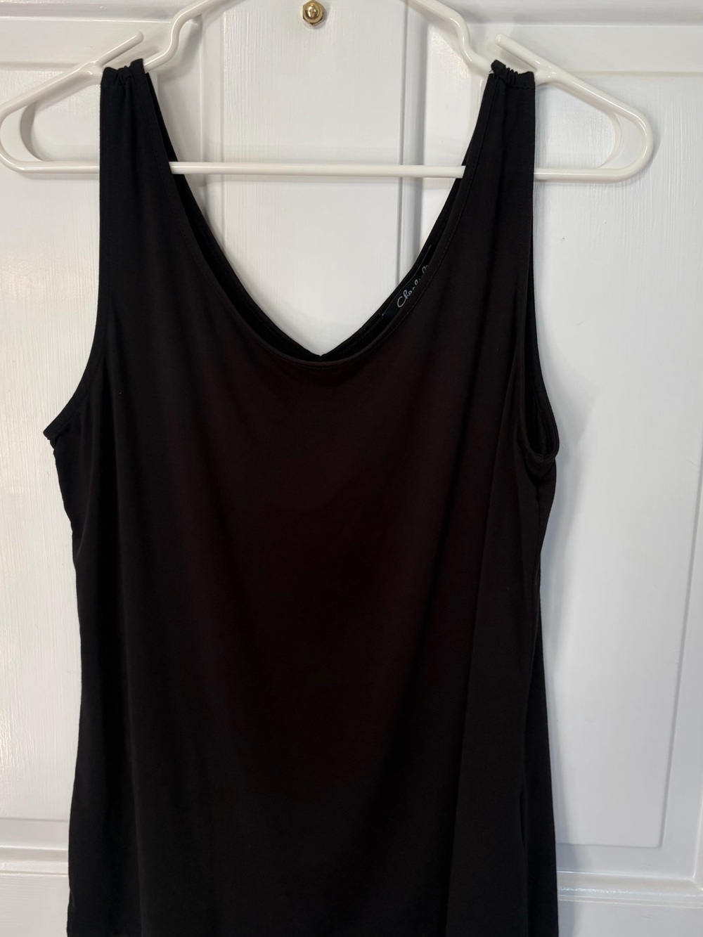 Charlotte Russe Black reversible tank can be worn scoop or V neck.